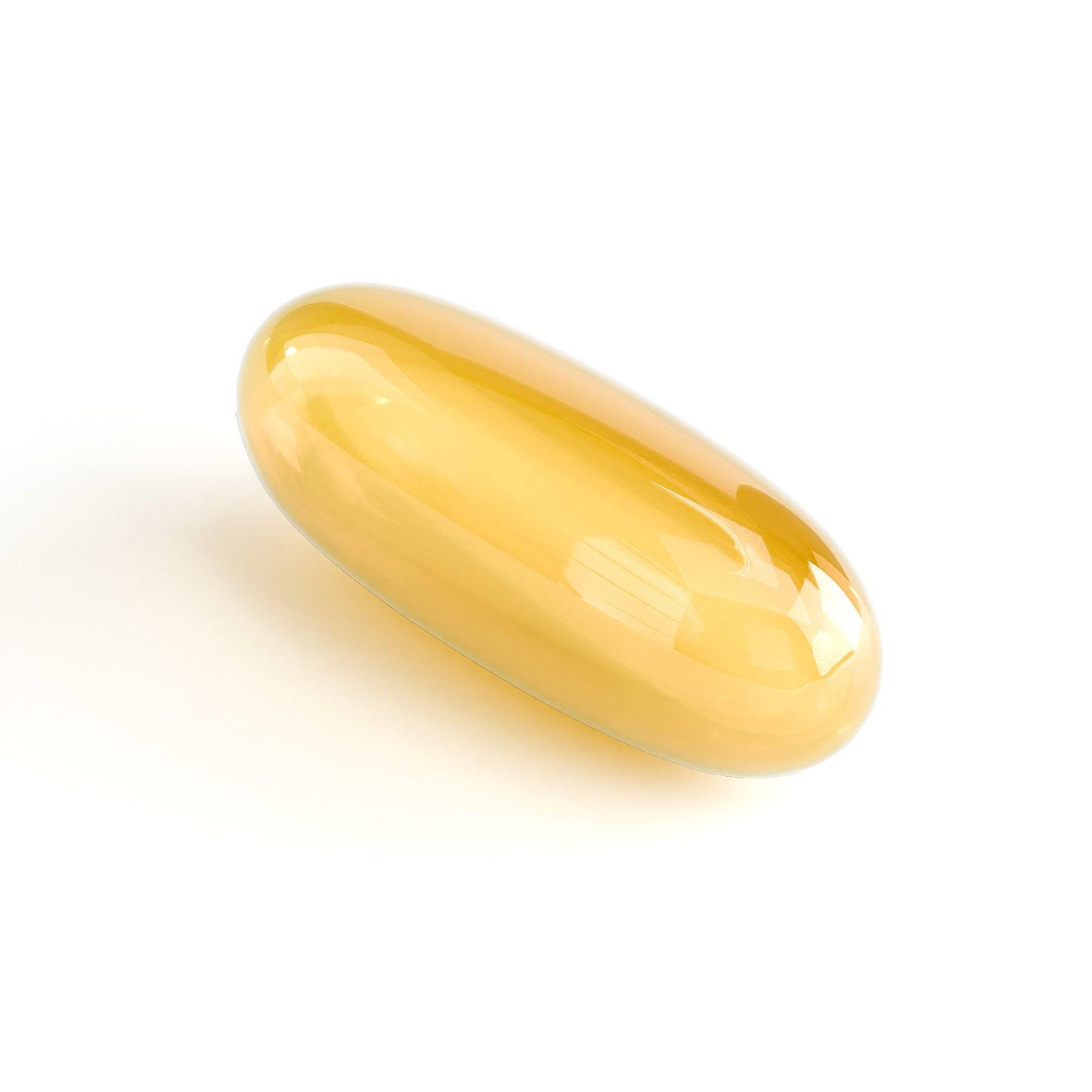 Close-up of a single Omega-3 softgel capsule, showcasing its smooth, golden, translucent appearance for easy consumption.